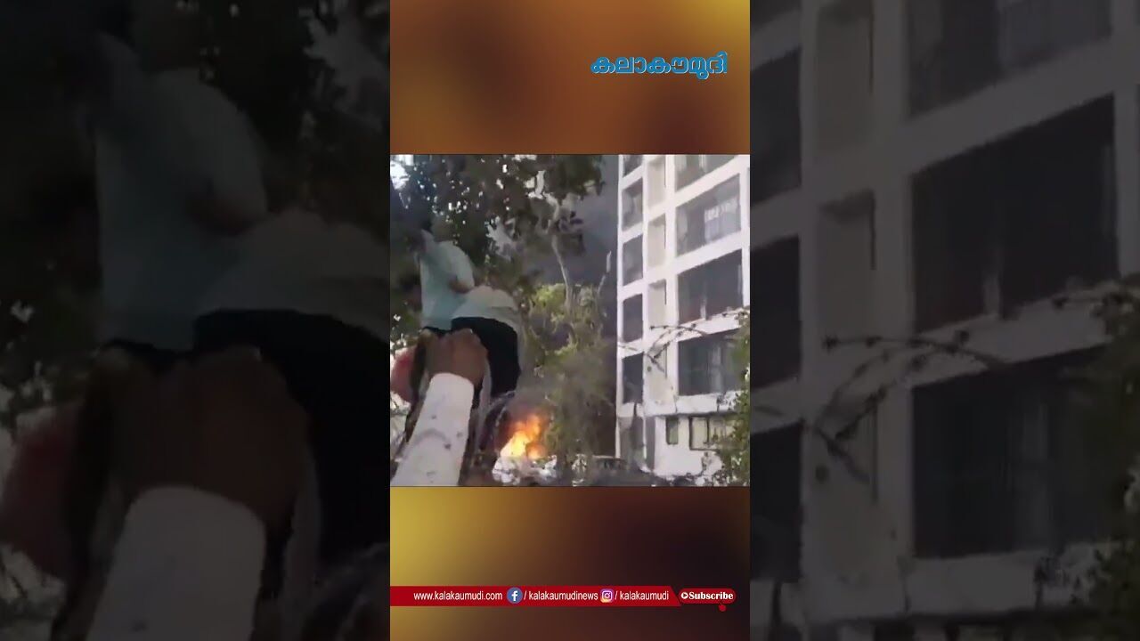 വിമാനാപകടത്തിന് പിന്നാലെ ഹോസ്റ്റൽ കെട്ടിടത്തിൽ നിന്നും രക്ഷപെടാൻ ശ്രമിക്കുന്ന വിദ്യാർഥികൾ